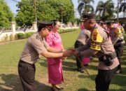 Kapolres Bima, Pimpin Upacara Raport Kenaikan Pangkat Periode 1 Januari  2024 dan Purna Bhakti Personel Polres Bima