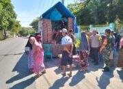 Pantau Pasar Murah, Bhabinkamtibmas Korleko Selatan Imbau Warga Jaga Ketertiban