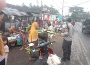 Polsek Pedagang Ingatkan Para Pedagang Tentang Peredaran Uang Palsu.