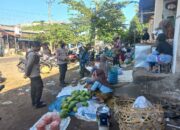 Patroli Rutin Polsek Pringgarata Sambangi Pasar Umum.