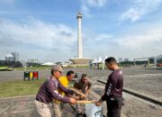 Polri Lakukan Bersih-bersih Usai Pesta Rakyat di Monas