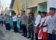 Kapolsek Brang Rea Hadiri Pawai Ta’aruf MTQ ke XX Tingkat Kecamatan di Desa Bangkat Monteh