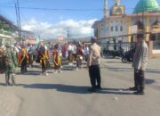 Polsek Maluk  Berikan Pengamanan Pada Peserta Pawai Karnaval Budaya