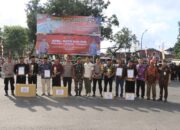 Wujudkan Pilkada Damai Polres Loteng Laksanakan Apel Satkamling