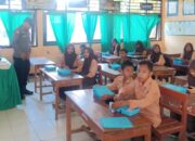 Polsek Madapangga Kawal Pendistribusian 3.415 Paket Makan Bergizi Gratis di 44 Sekolah