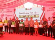 Polda Sulut Serahkan 200 Paket Bansos kepada Pengemudi Ojol